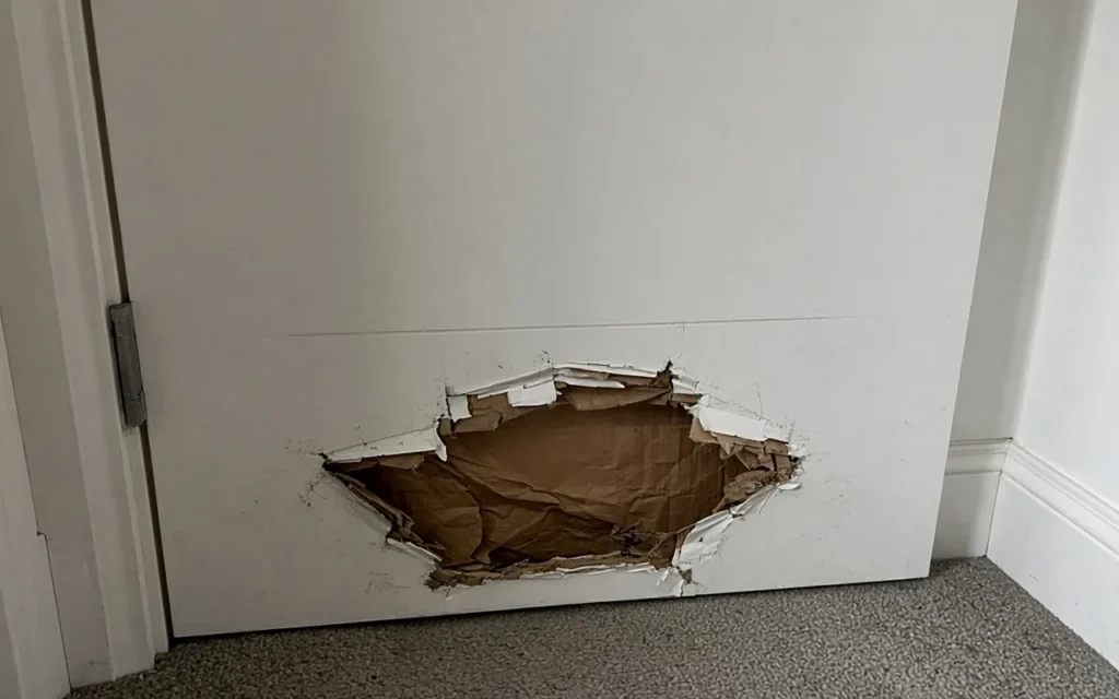 Hole in a Wood Door: Simple Patching and Refinishing Guide